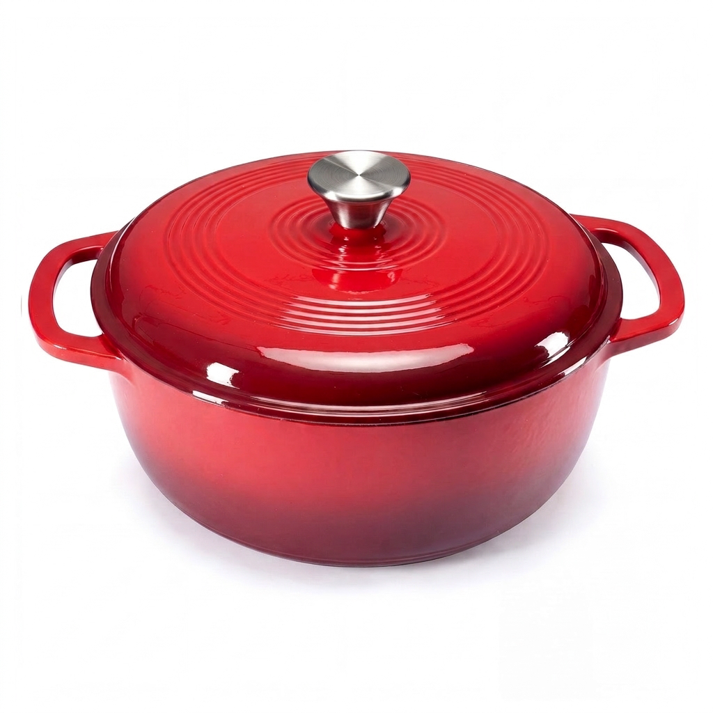 Red enameled cast iron Dutch oven on white background