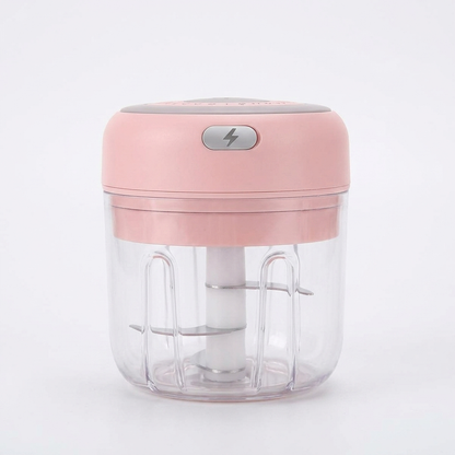 Pink electric garlic chopper on white background